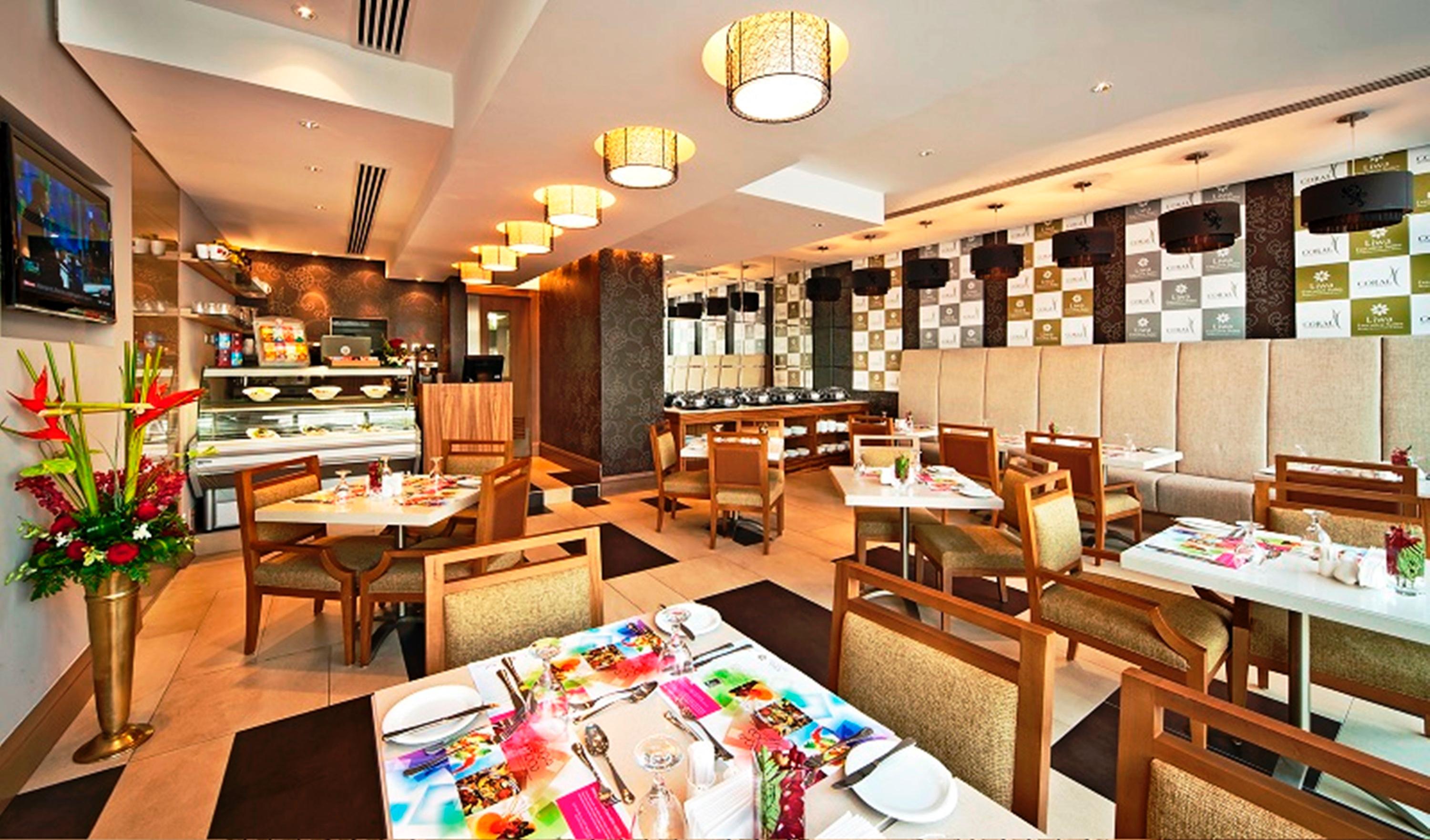 Oaks Liwa Executive Suites Abu Dhabi Restaurang bild